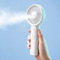 Handheld mist fan studio shot