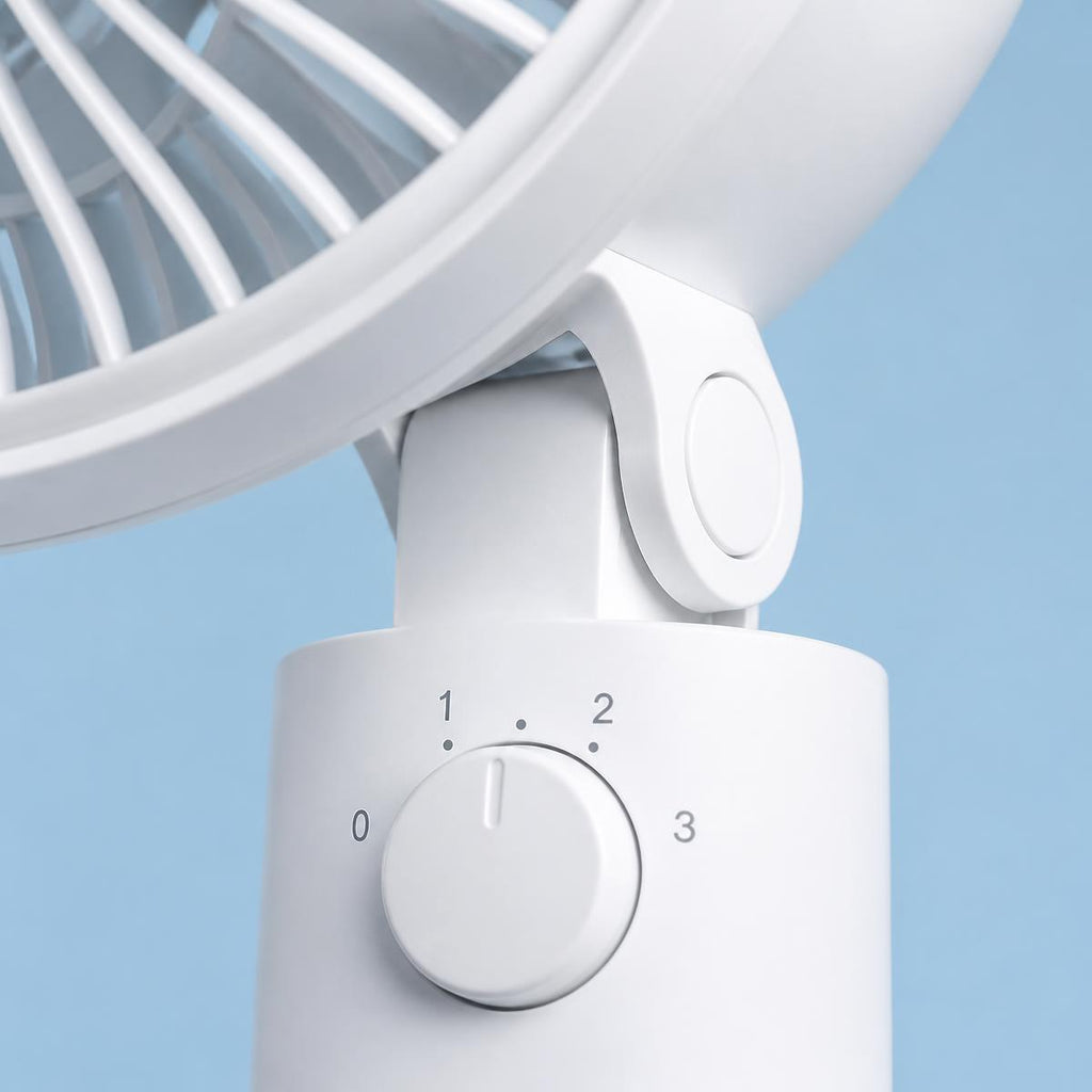 Quiet mini fan tilt hinge and speed dial close-up